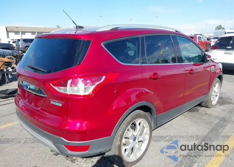 2016 Ford Escape Titanium z USA, uszkodzony, nr VIN 1FMCU0J91GUA39760